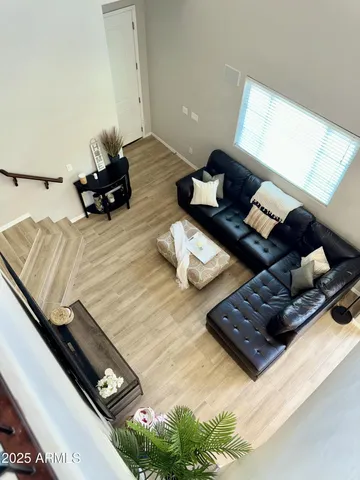 a living room with furniture and a couch