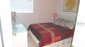 a bathroom with a shower and toilet