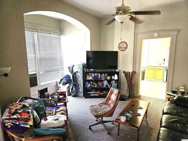 a room with gym equipment and a window