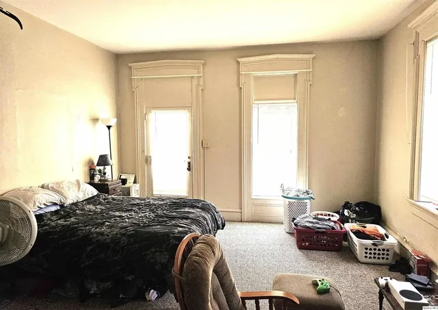 a kitchen with cabinets appliances and a sink