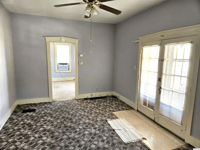 a bathroom with a sink and a window