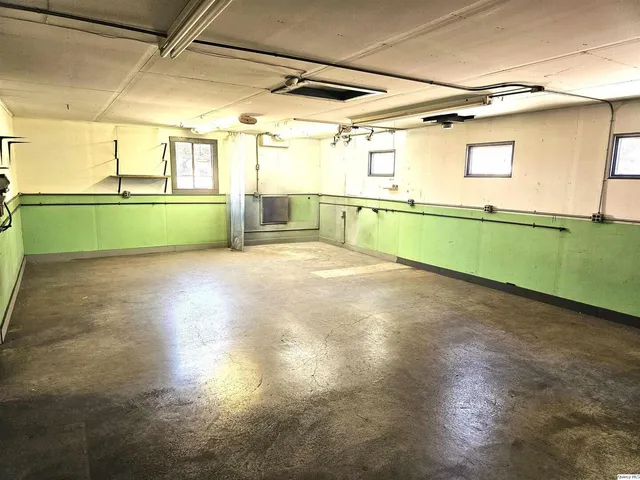 a view of a porch and garden