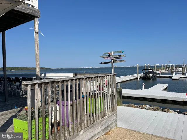 a view of a balcony with chairs