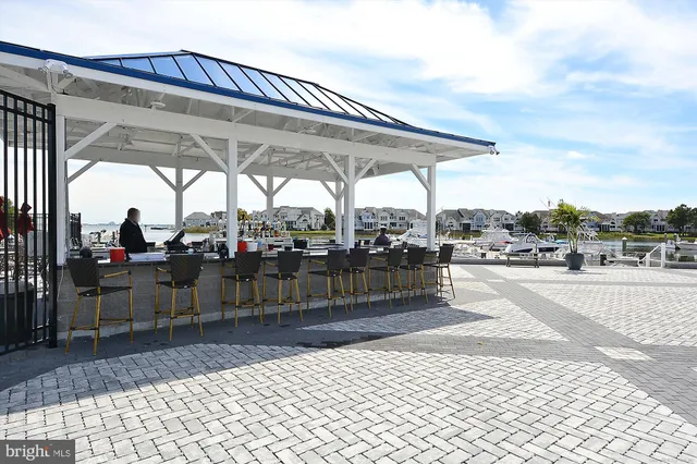 a view of a terrace with furniture and a table