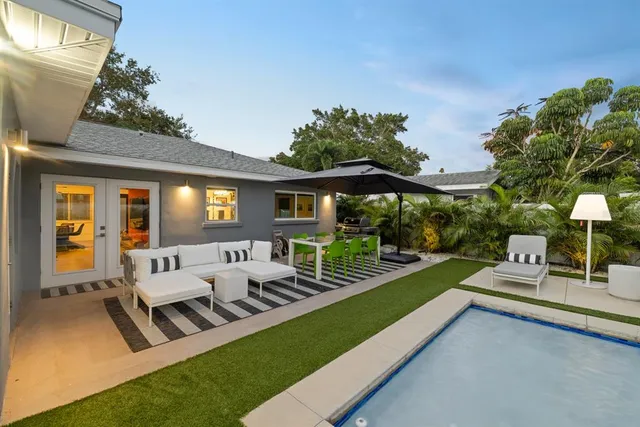 a view of yard with patio