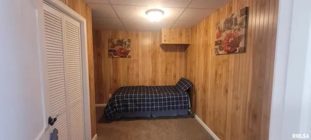 a bathroom with a bathtub sink and mirror