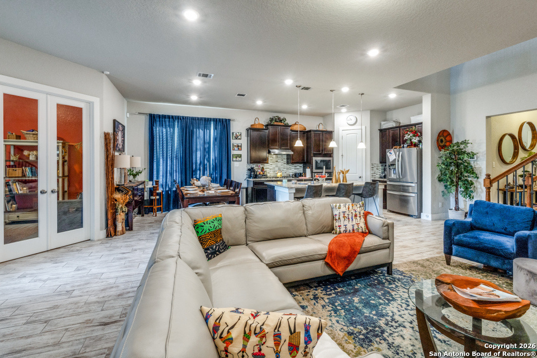 1712 Delafield Road San Antonio, TX 78253 - Photo 12 of 25 a living room with furniture kitchen view and a large window