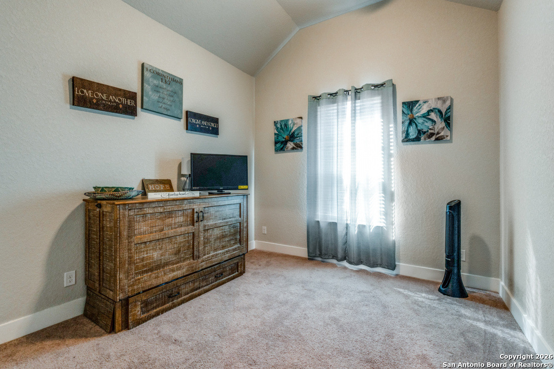 1712 Delafield Road San Antonio, TX 78253 - Photo 15 of 25 a view of room with furniture and flat screen tv