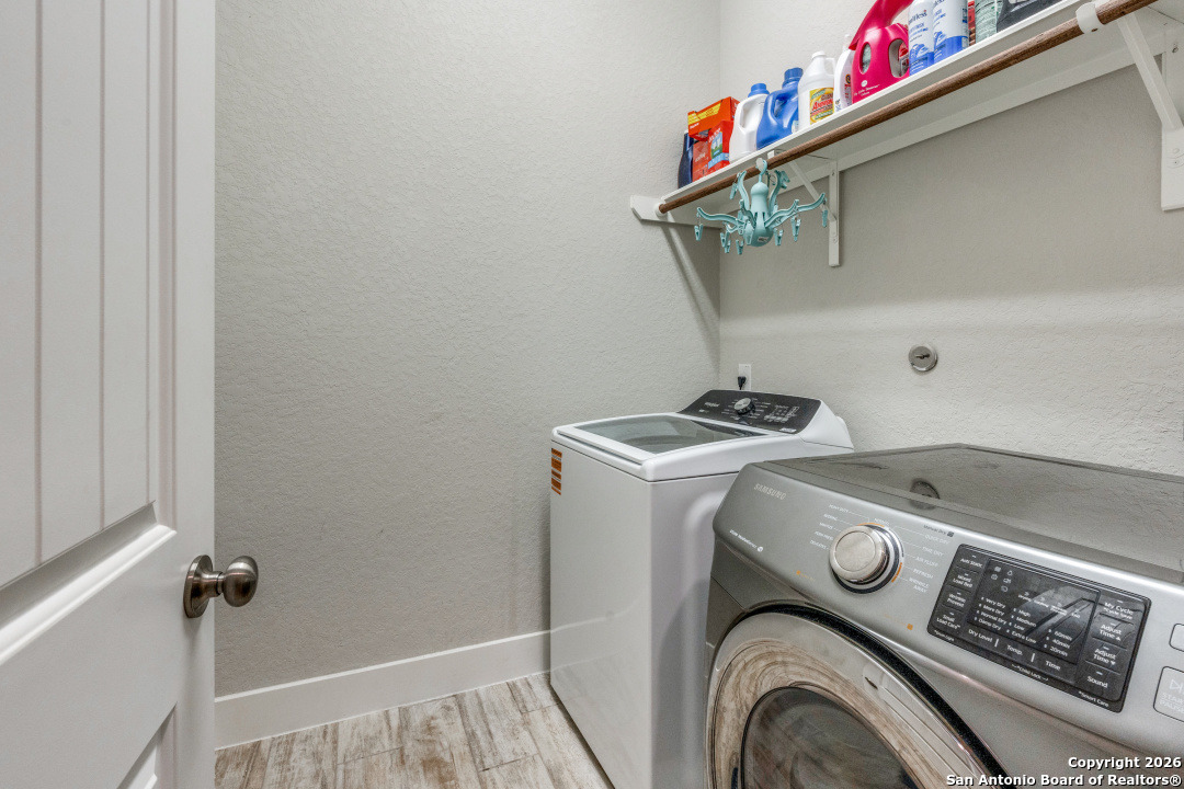 1712 Delafield Road San Antonio, TX 78253 - Photo 18 of 25 a utility room with dryer and washer