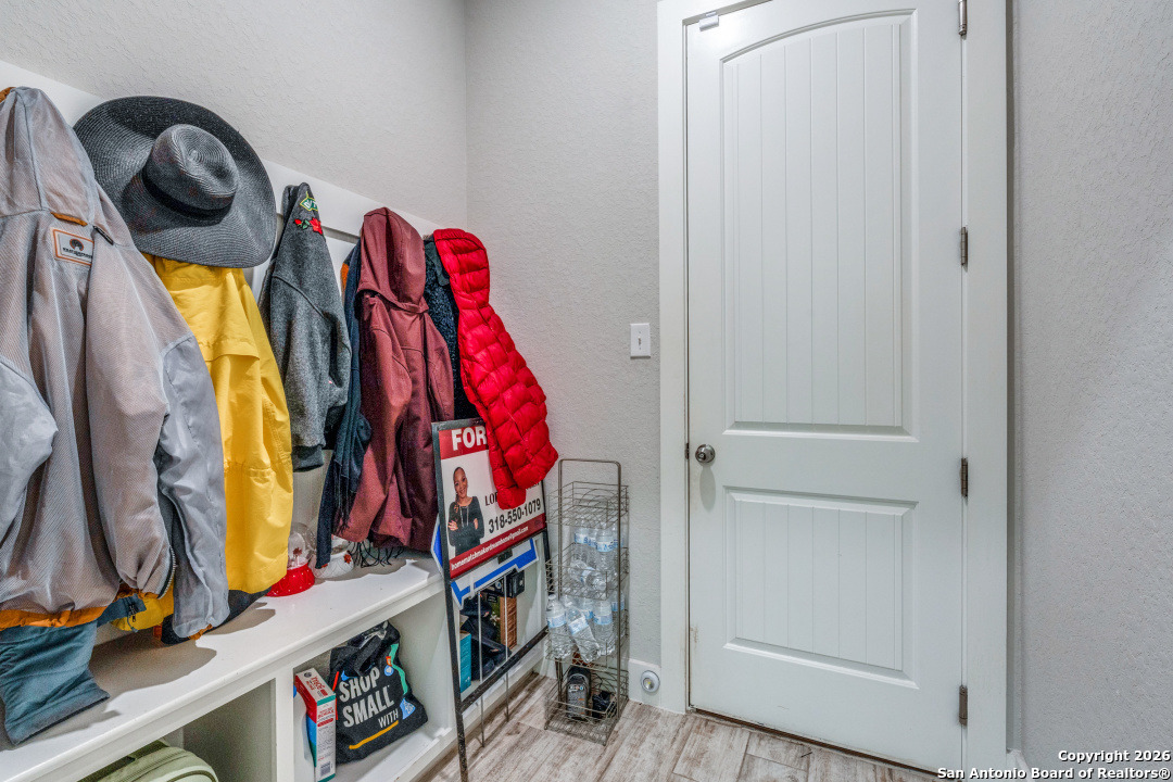 1712 Delafield Road San Antonio, TX 78253 - Photo 20 of 25 a view of walk in closet with clothes and shoes