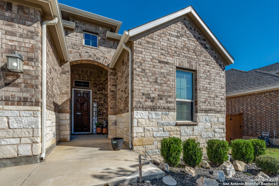 1712 Delafield Road San Antonio, TX 78253 - Photo 4 of 25 a front view of a house with a garage