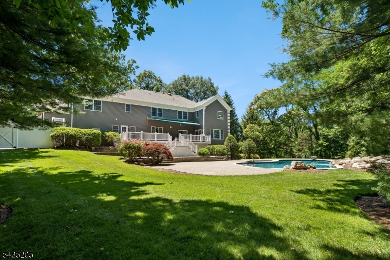 12 Oak Hill Road Bernards, NJ 07920 - Photo 32 of 33 a view of a house with backyard and sitting area