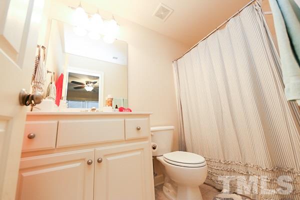 4740 Sandy Bay Circle Raleigh, NC 27603 - Photo 15 of 24 a bathroom with a sink and a mirror