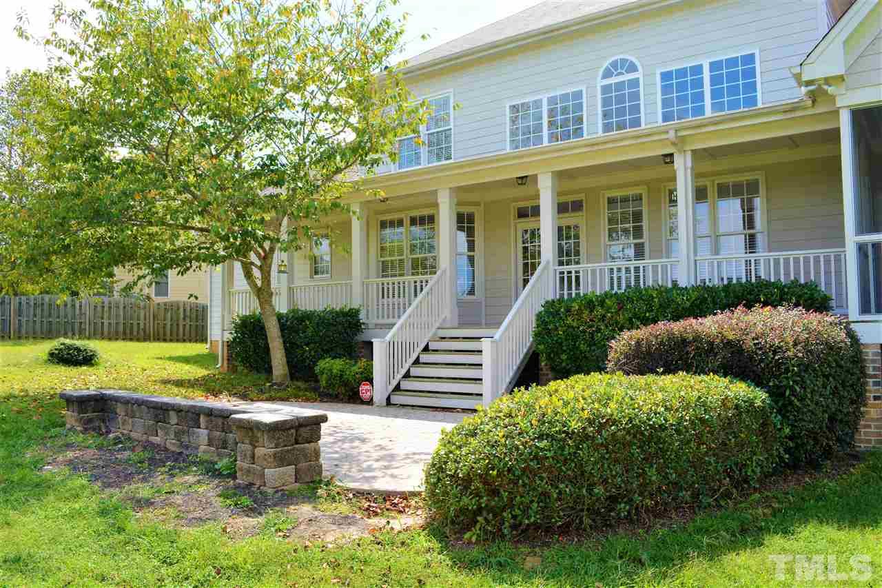 4740 Sandy Bay Circle Raleigh, NC 27603 - Photo 22 of 24 front view of a house with a yard