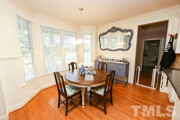 4740 Sandy Bay Circle Raleigh, NC 27603 - Photo 6 of 24 a dining room with furniture and window