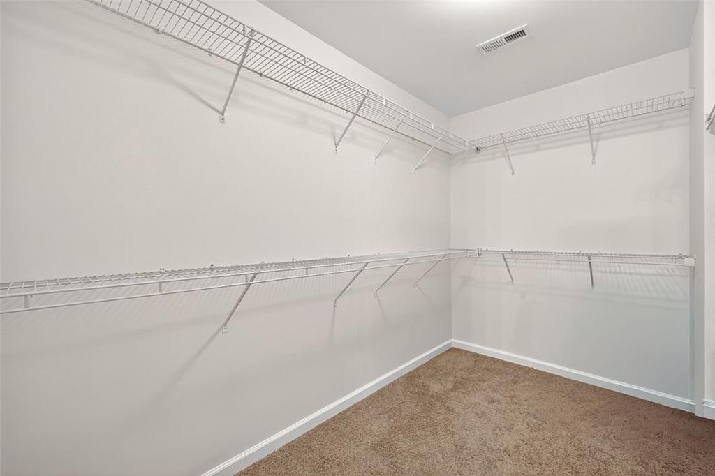 2517 Kolb Manor Circle Southwest Marietta, GA 30008 - Photo 20 of 33 a view of a room with racks on the wall