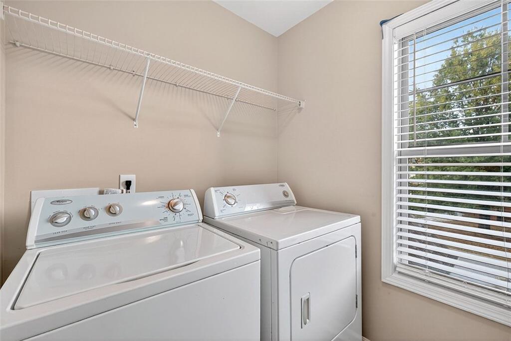 2517 Kolb Manor Circle Southwest Marietta, GA 30008 - Photo 22 of 33 a utility room with dryer and washer