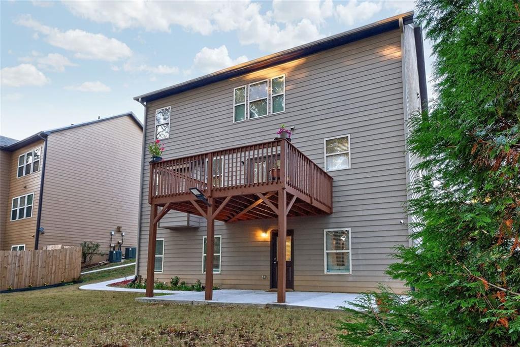 2517 Kolb Manor Circle Southwest Marietta, GA 30008 - Photo 31 of 33 a view of a house with a yard