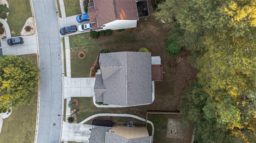 2517 Kolb Manor Circle Southwest Marietta, GA 30008 - Photo 33 of 33 an aerial view of a house with a yard and trees