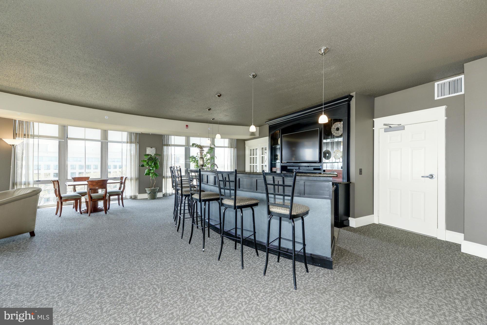 11800 Sunset Hills Road, Unit 517 Reston, VA 20190 - Photo 24 of 29 a view of a living room and dining room