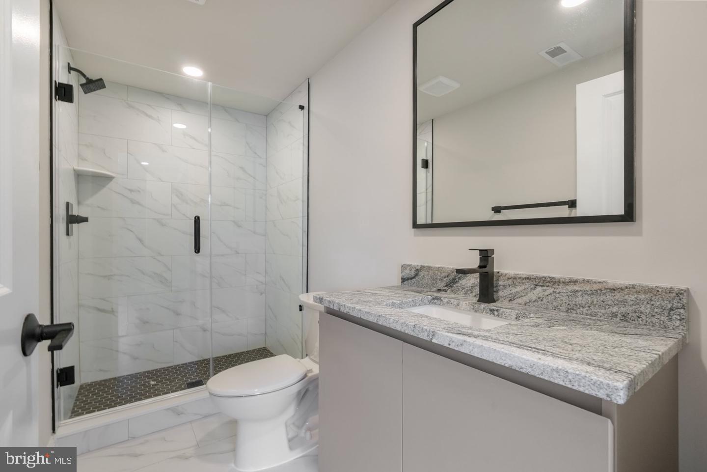 2709 Priya, Unit A76 Philadelphia, PA 19131 - Photo 14 of 29 Sleek modern bathroom retreat.