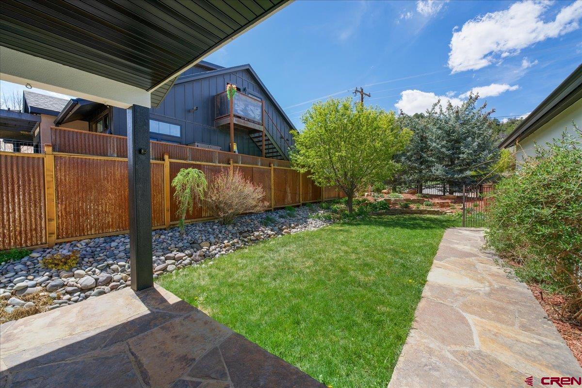 320 South Amelia Street Ridgway, CO 81432 - Photo 2 of 40 a view of a back yard of the house