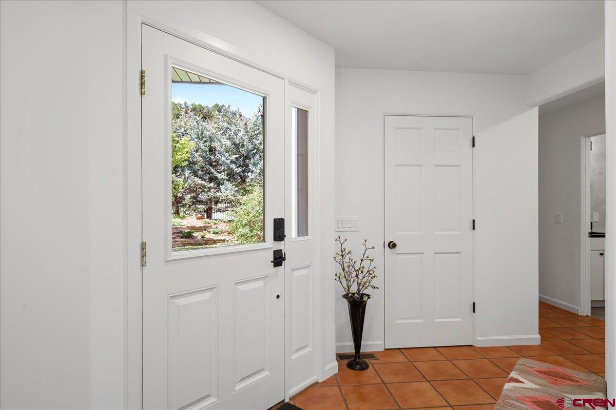 320 South Amelia Street Ridgway, CO 81432 - Photo 4 of 40 a view of small space with wooden floor and a window