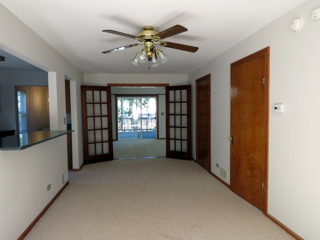 304 Ralph Court Island Lake, IL 60042 - Photo 7 of 16 a view of an empty room with a window