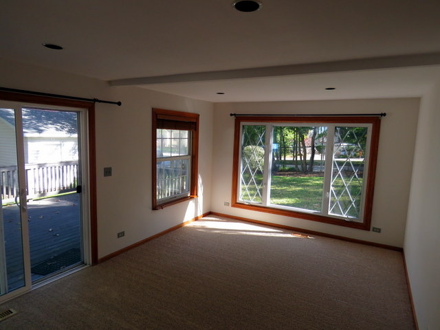 304 Ralph Court Island Lake, IL 60042 - Photo 9 of 16 a view of empty room with front door