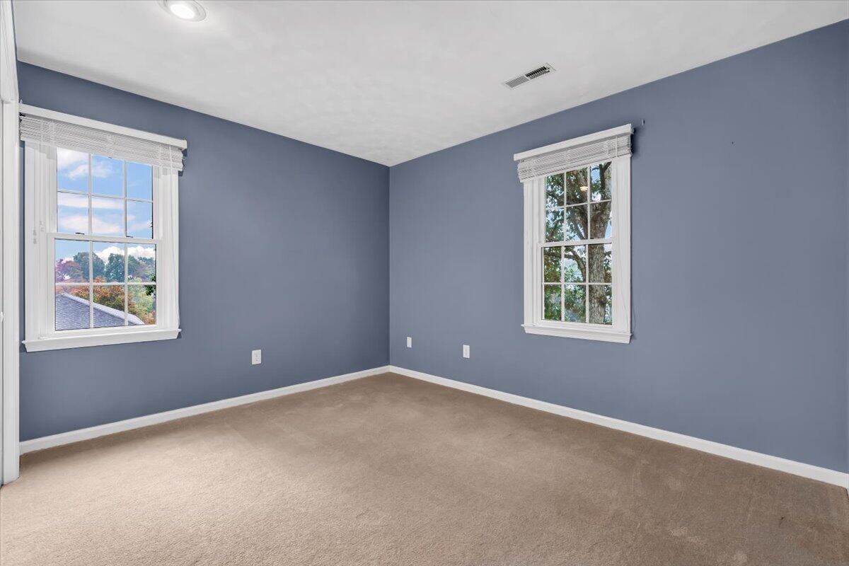 278 Stonehaven Lane Blue Ridge, VA 24064 - Photo 42 of 61 an empty room with windows