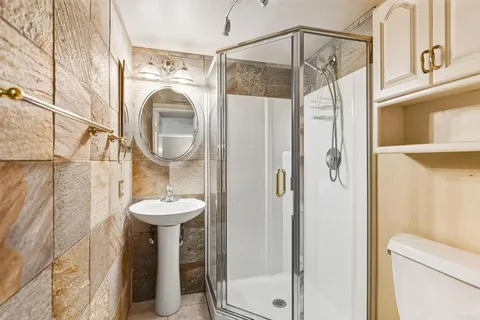 a bathroom with a sink and mirror