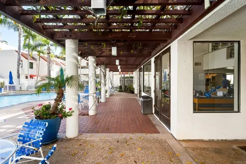 a view of a porch with furniture