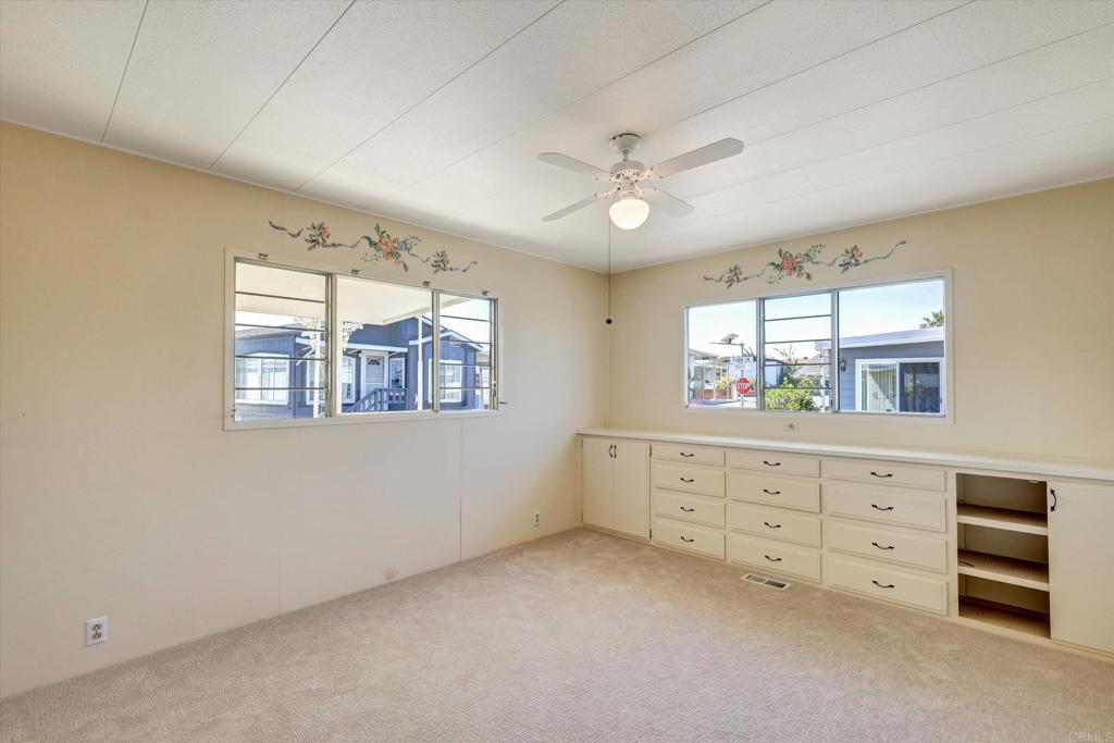 287 Robin Lane Oceanside, CA 92057 - Photo 19 of 27 a room with furniture and a window