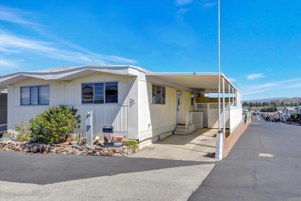 287 Robin Lane Oceanside, CA 92057 - Photo 2 of 27 a front view of a house with yard