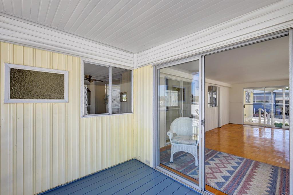 287 Robin Lane Oceanside, CA 92057 - Photo 24 of 27 a living room with furniture and a fireplace
