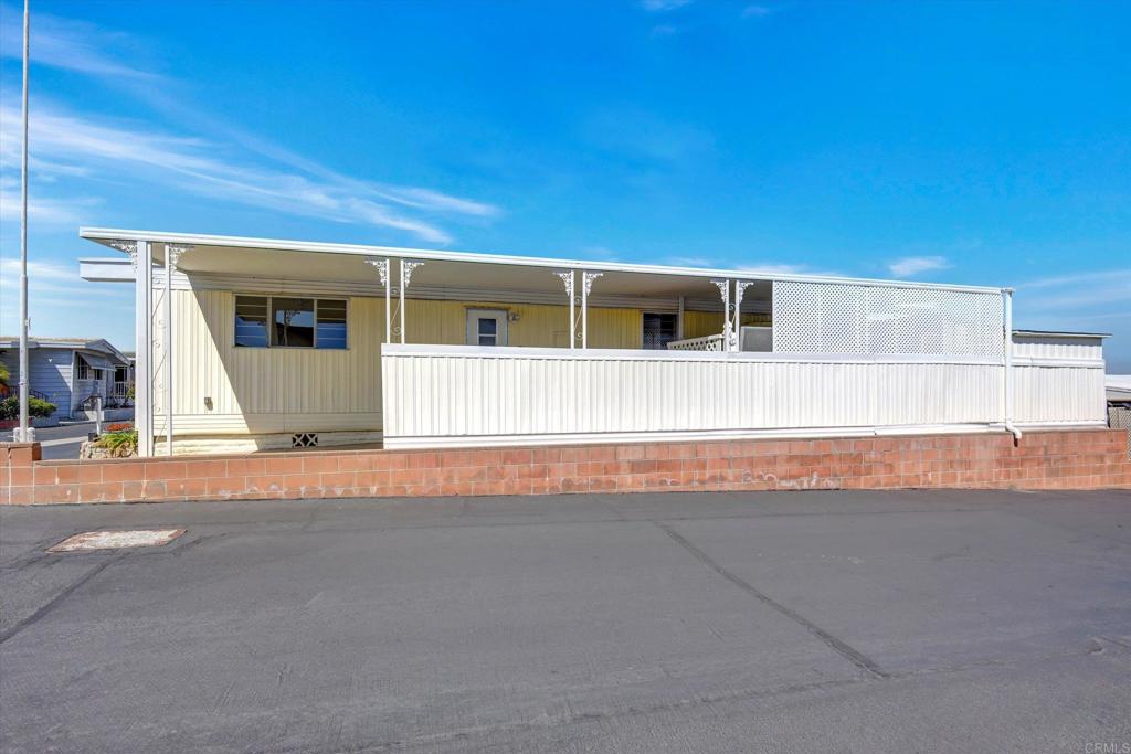 287 Robin Lane Oceanside, CA 92057 - Photo 27 of 27 a view of a house with a garage