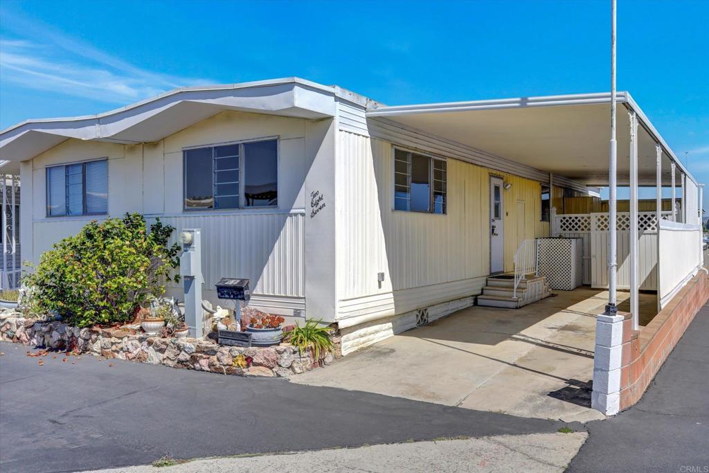 287 Robin Lane Oceanside, CA 92057 - Photo 3 of 27 a front view of a house with a yard