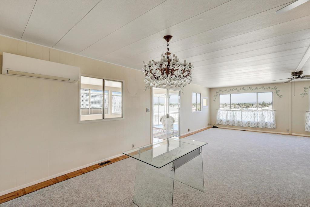 287 Robin Lane Oceanside, CA 92057 - Photo 5 of 27 a view of an empty room with a window