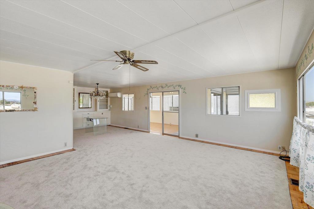 287 Robin Lane Oceanside, CA 92057 - Photo 9 of 27 a view of an empty room with a window