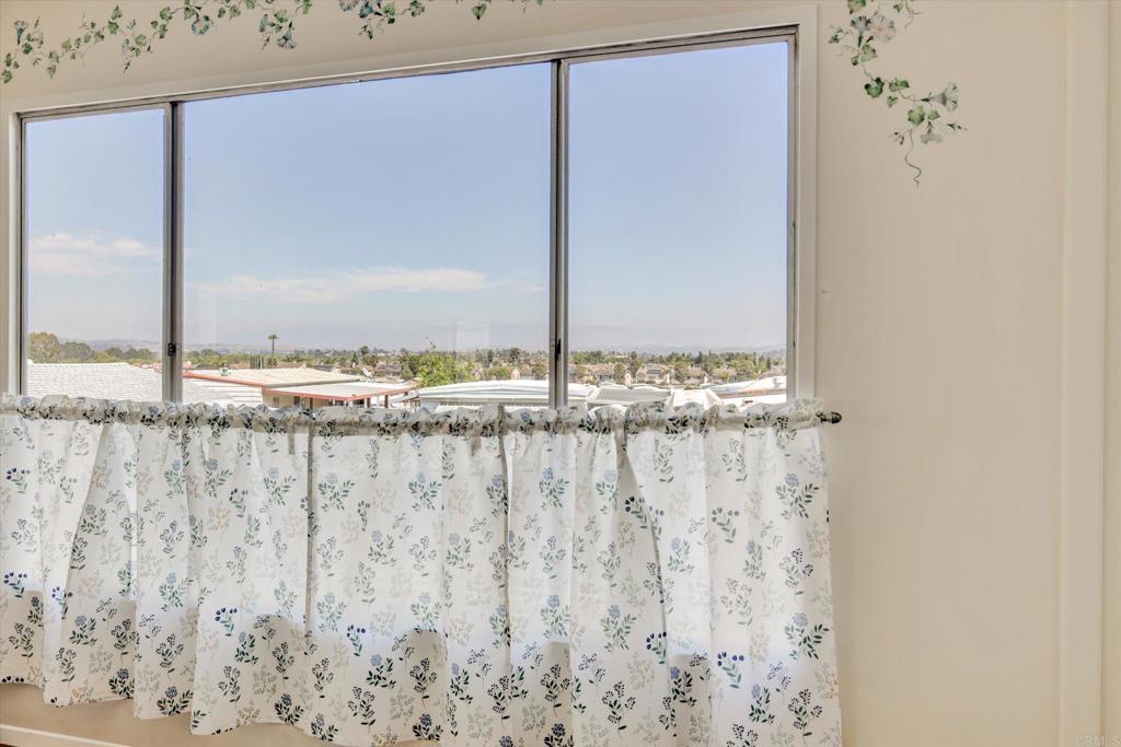 287 Robin Lane Oceanside, CA 92057 - Photo 10 of 27 a view of a window with wooden floor