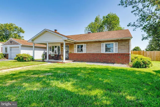 a view of outdoor space yard and front view of a house
