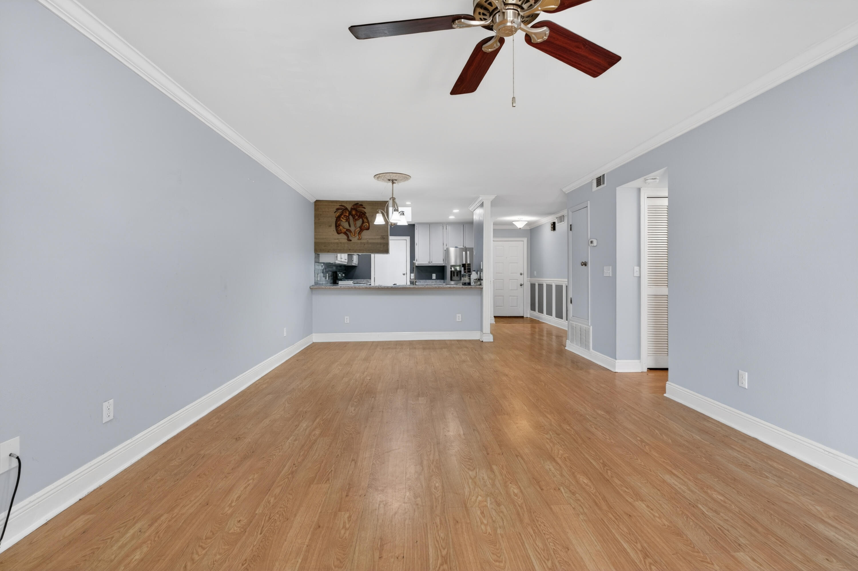 91 Catamaran Lane Shalimar, FL 32579 - Photo 11 of 24 a view of empty room with wooden floor and ceiling fan