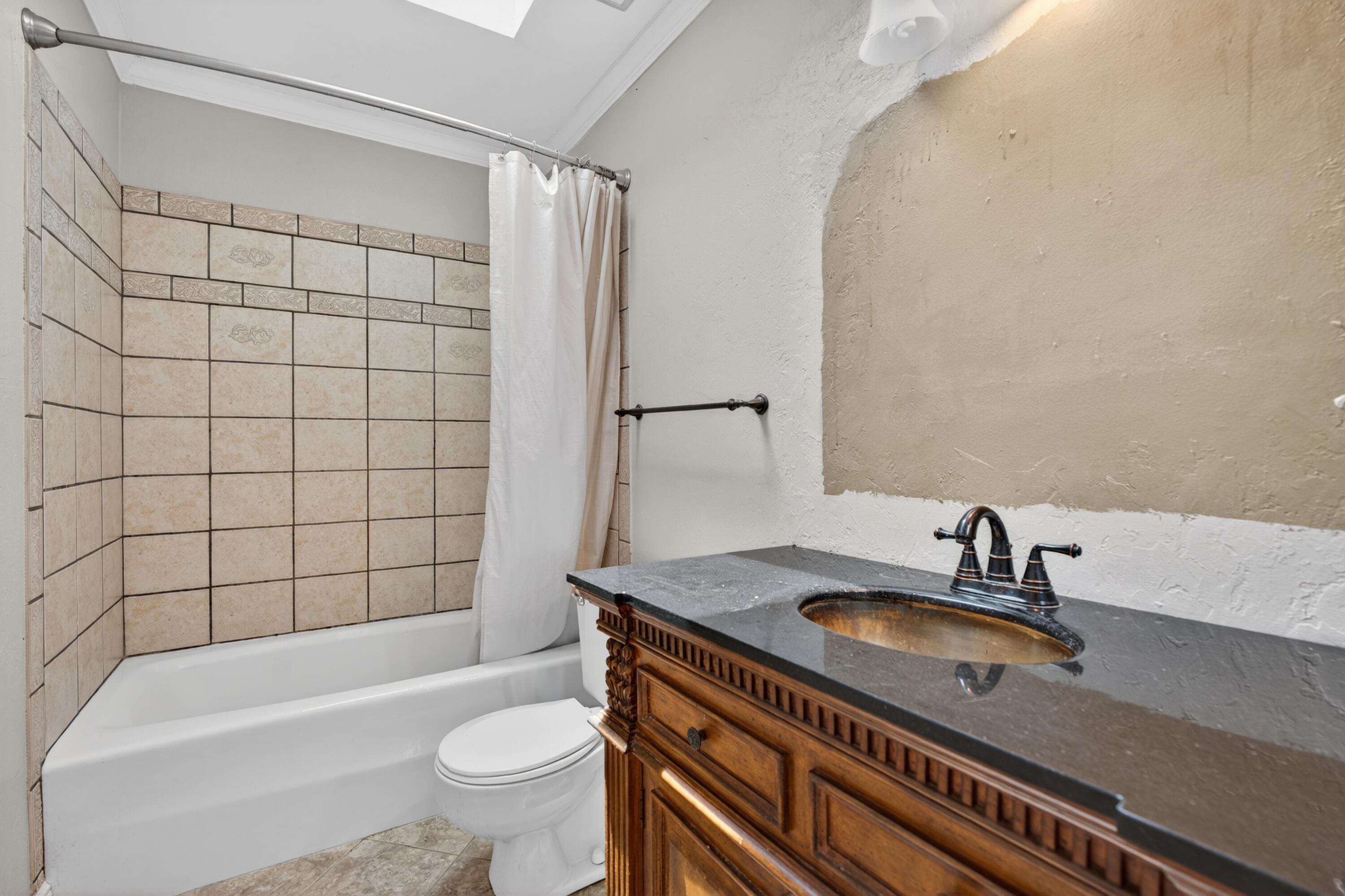 91 Catamaran Lane Shalimar, FL 32579 - Photo 14 of 24 a bathroom with a sink a toilet and bathtub