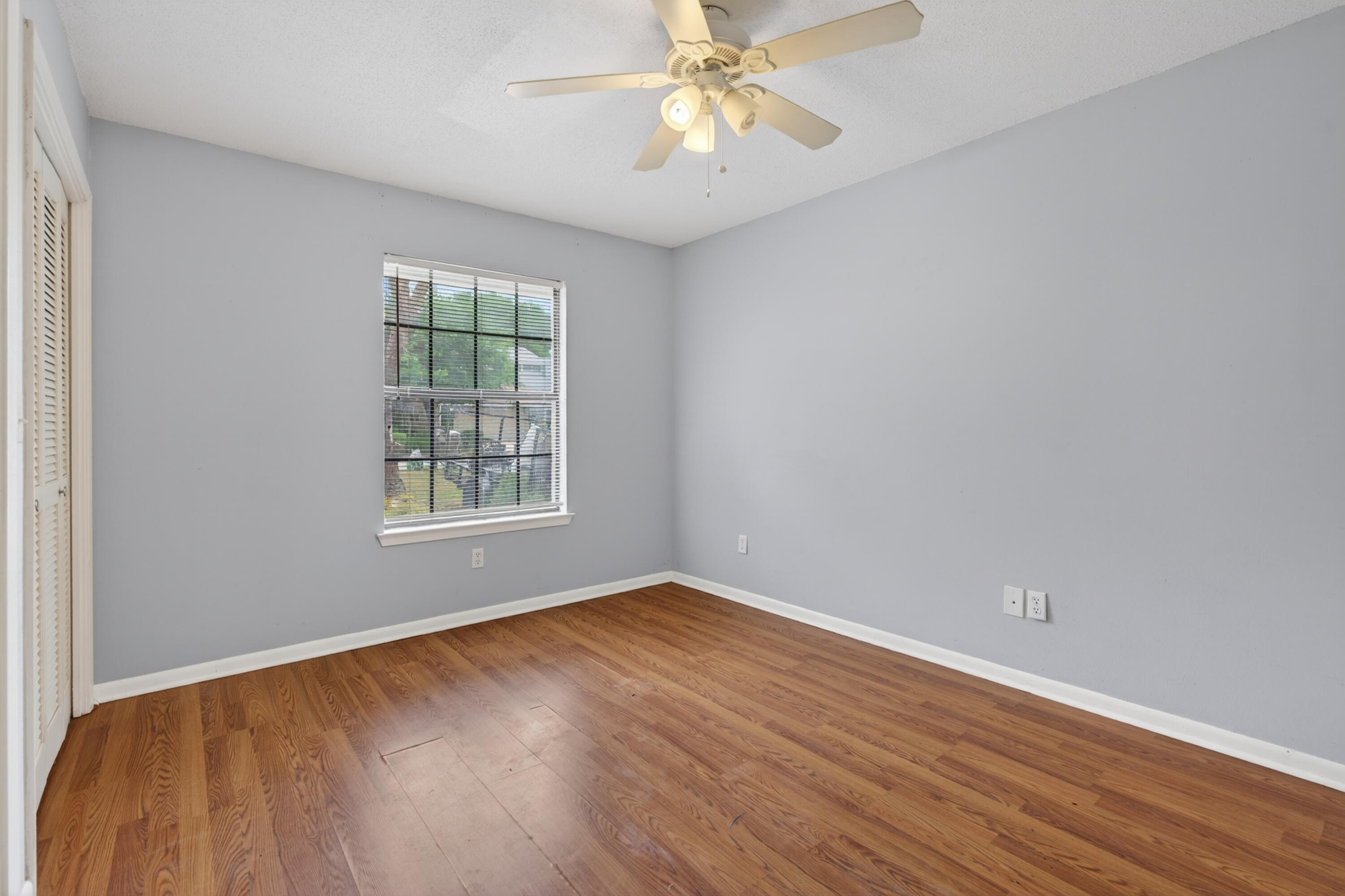 91 Catamaran Lane Shalimar, FL 32579 - Photo 17 of 24 wooden floor in an empty room with a window