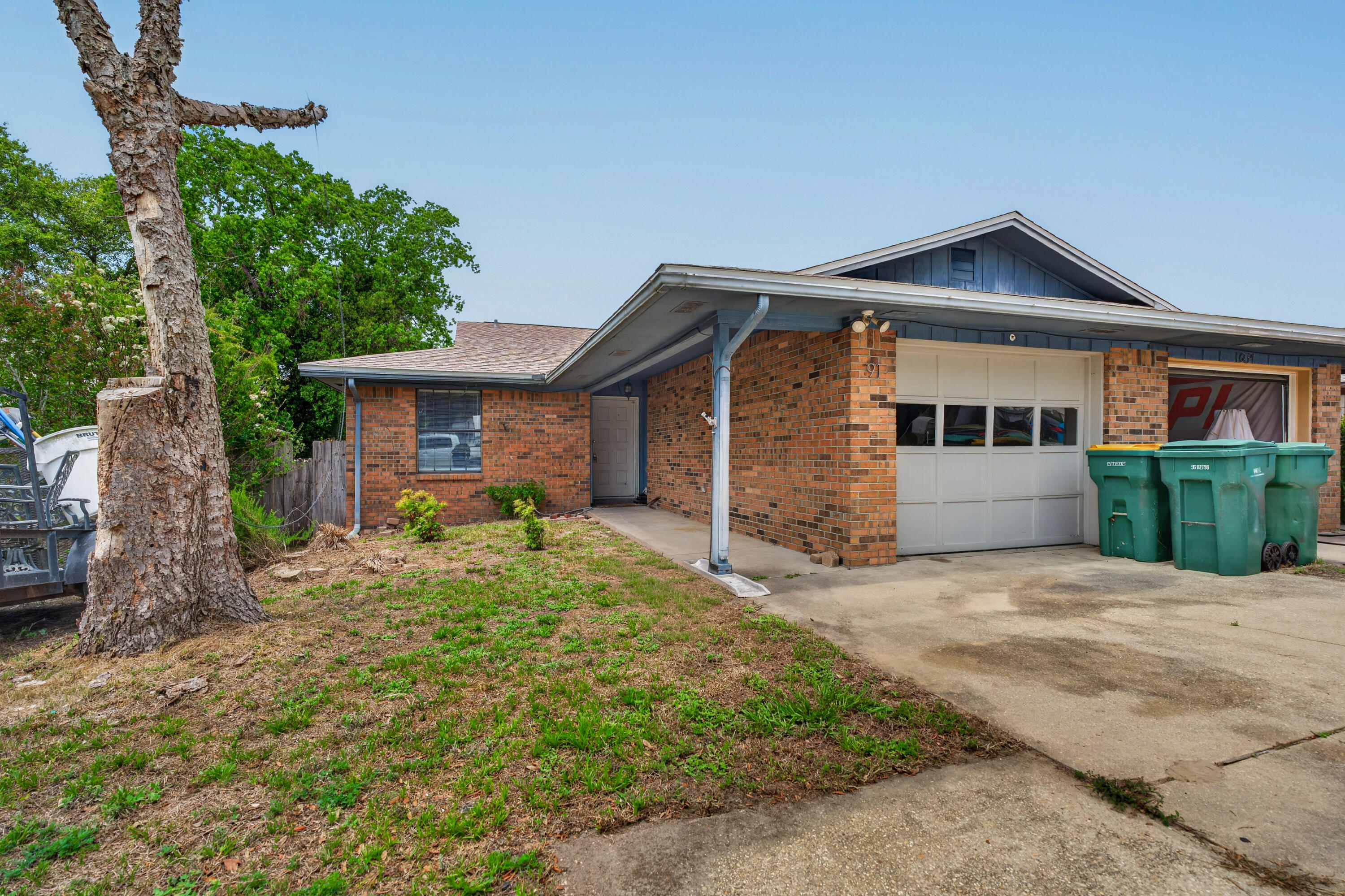 91 Catamaran Lane Shalimar, FL 32579 - Photo 2 of 24 a front view of a house with garden