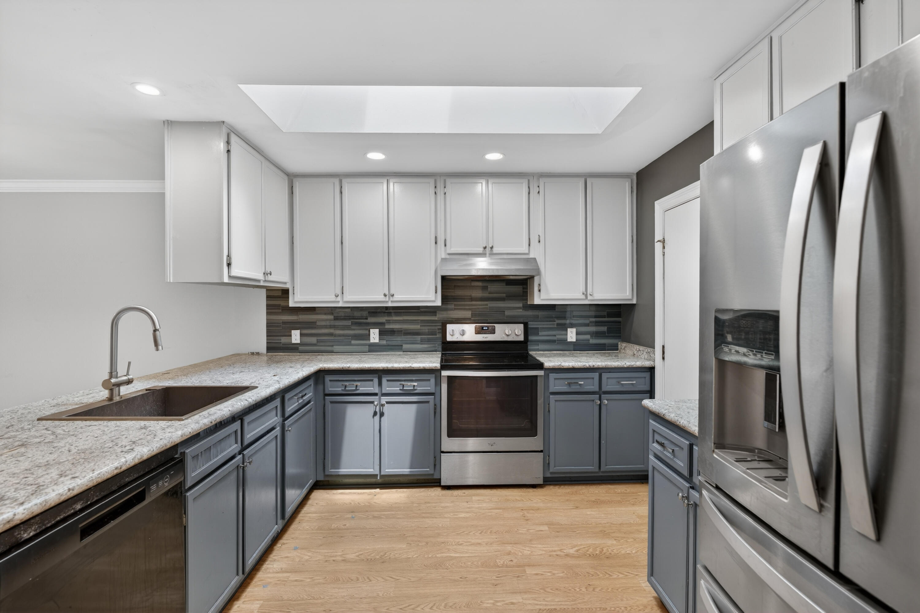 91 Catamaran Lane Shalimar, FL 32579 - Photo 5 of 24 a kitchen with stainless steel appliances granite countertop a sink stove and refrigerator