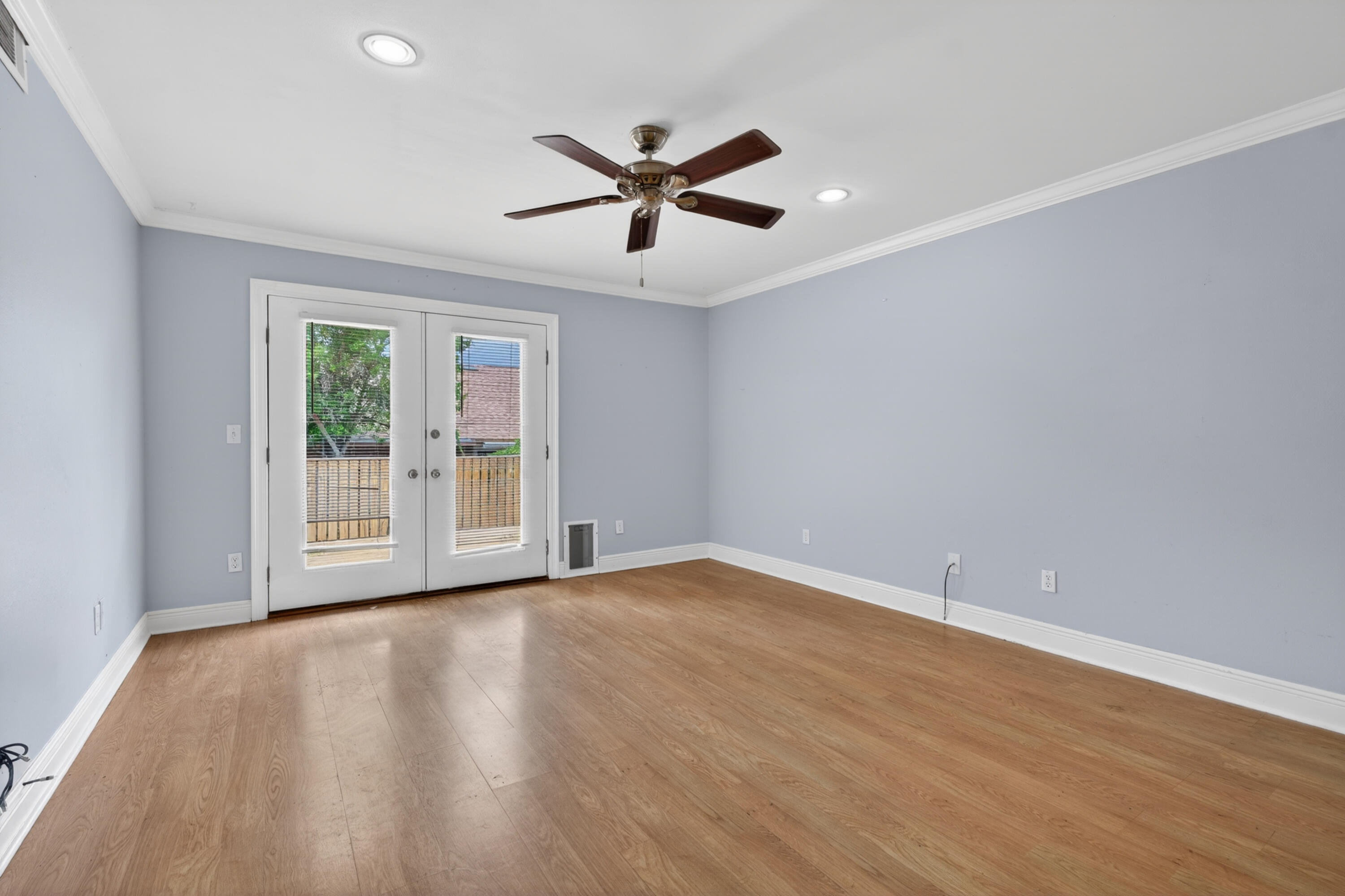 91 Catamaran Lane Shalimar, FL 32579 - Photo 9 of 24 a view of an empty room with wooden floor and a window
