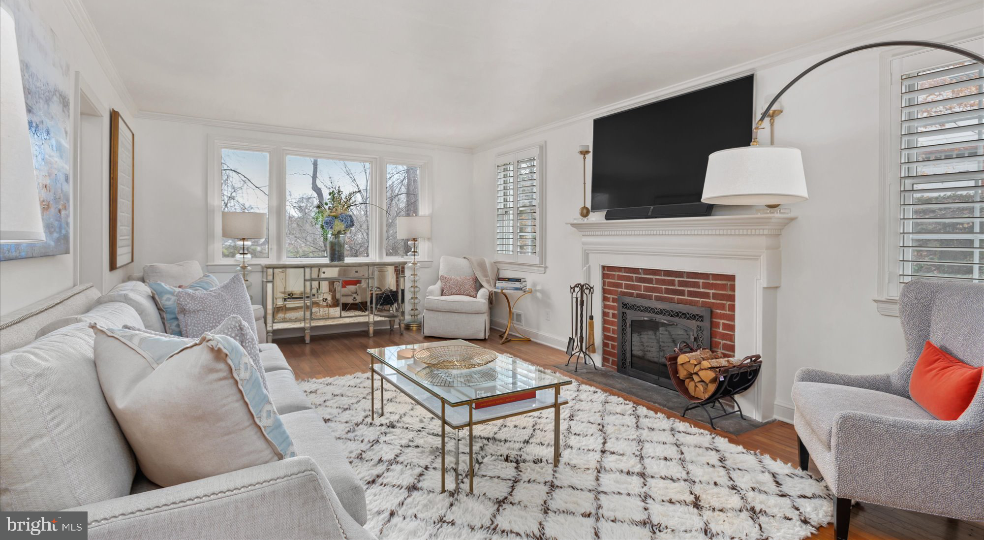 6309 Poe Road Bethesda, MD 20817 - Photo 3 of 20 Living room with brick surround fireplace