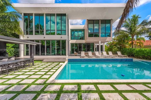 a view of a backyard and a house