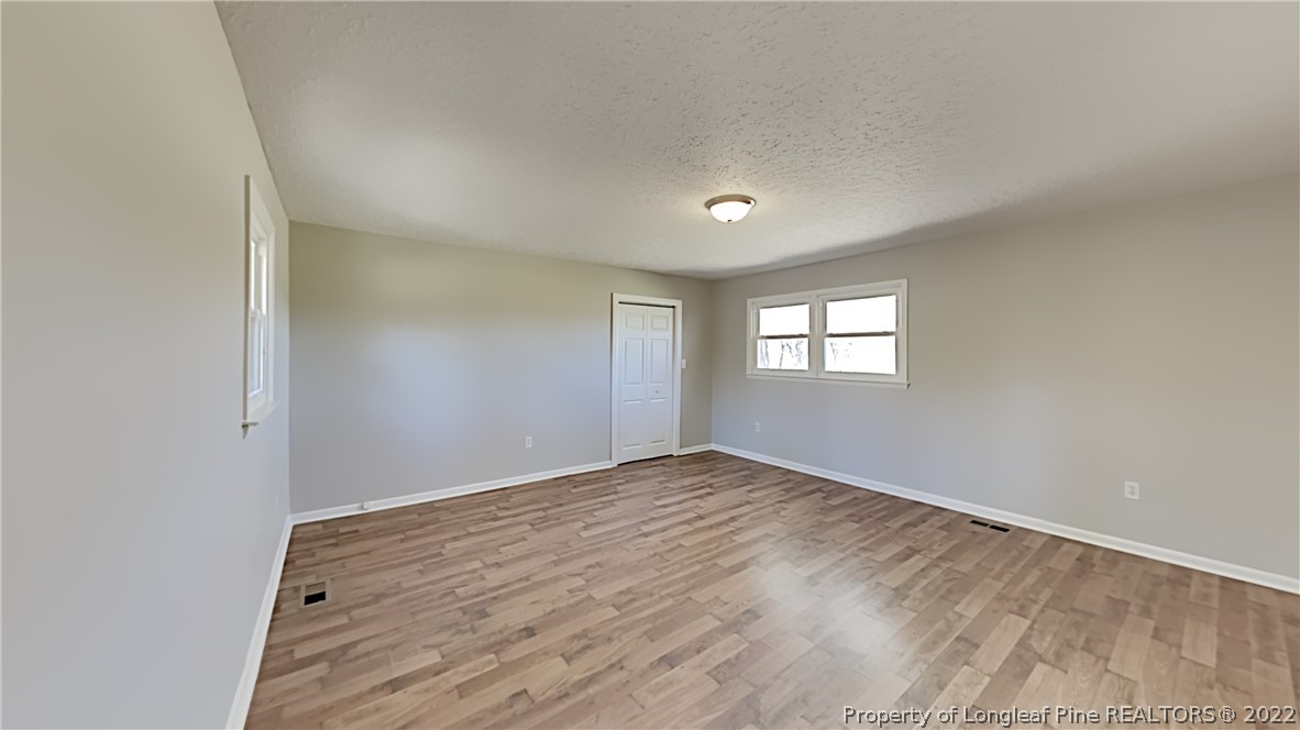 2753 Wade-Stedman Road Stedman, NC 28391 - Photo 6 of 15 a view of an empty room and window